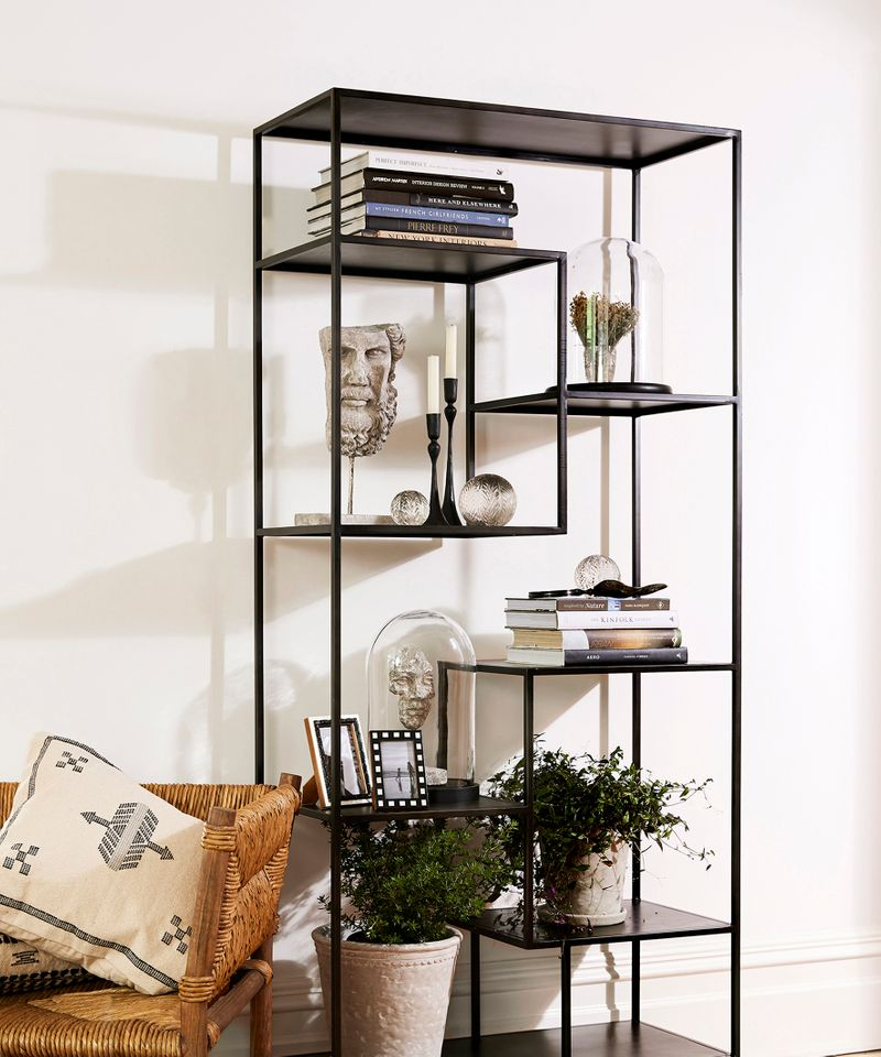 Black Metal Staggered Shelf in Maximizing vertical space with black etagere designs that blend form and function