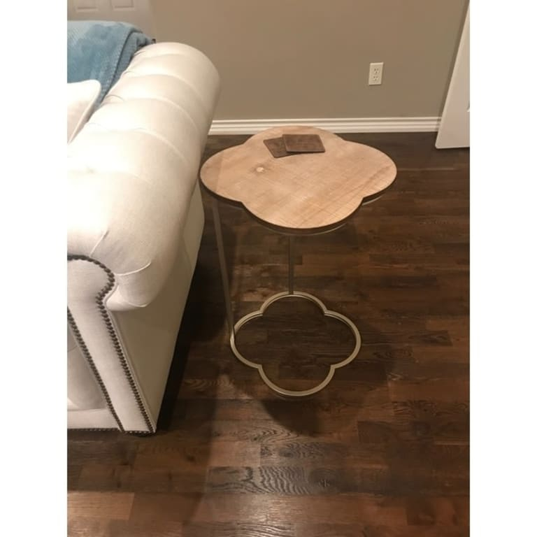 Exploring the C-Shaped Quatrefoil Metal Table with Natural Wood Finish