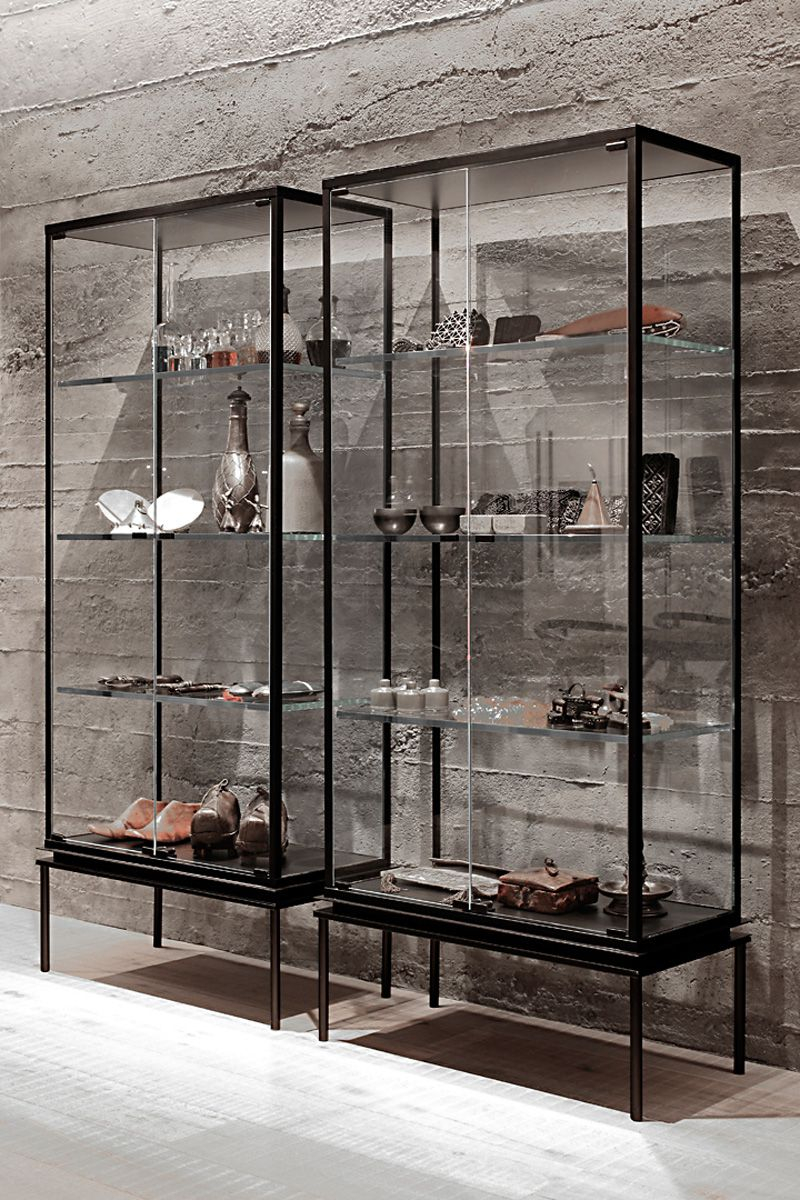 Glass Display Cabinet Adjustable Shelves with regard to How a blue metal and glass cabinet transforms living room storytelling in 2026